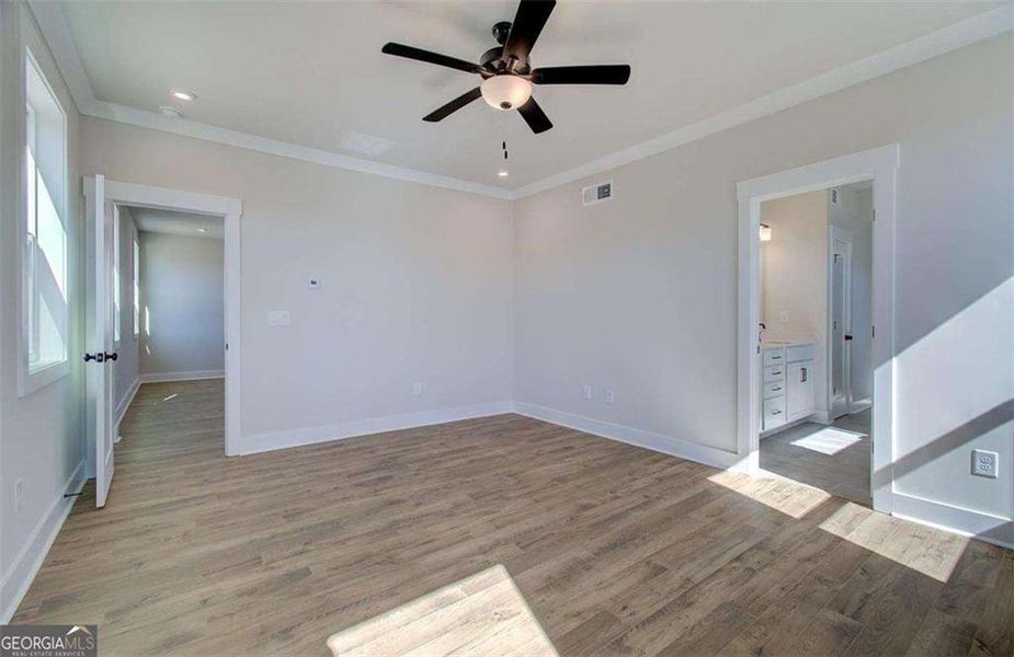 Spacious, unfurnished interior of a new home in The Paddocks at Doc Hughes, Buford (Image 45).