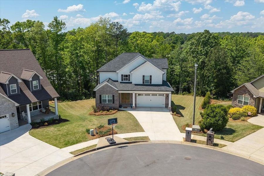 Front exterior of a new home in , Carrollton, GA, highlighting curb appeal (Image 24).
