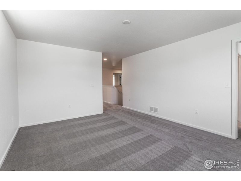 Spacious, unfurnished interior of a new home in Granary Trailblazer Collection - Single Family Homes, Johnstown (Image 36).