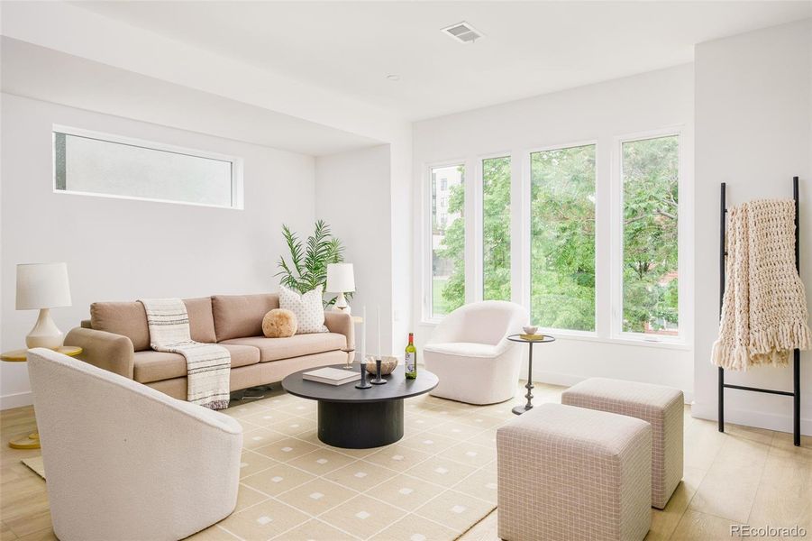 Enjoy sunshine all day from large, west-facing windows