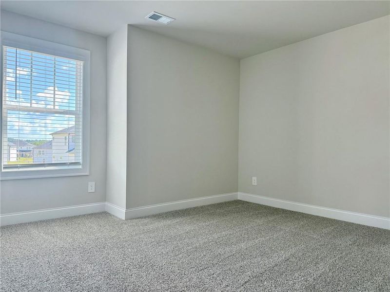 Spacious, unfurnished interior of a new home in Vines at Mill Creek - Legacy Series, Braselton (Image 18).