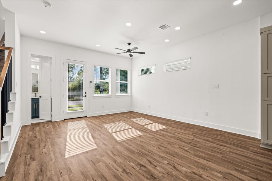 Sun-drenched afternoons await. Striking linear shadows filter through the windows, emphasizing the impressive footprint of the main level.
