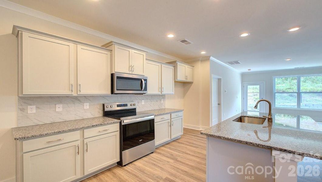 Photos are representative - model home