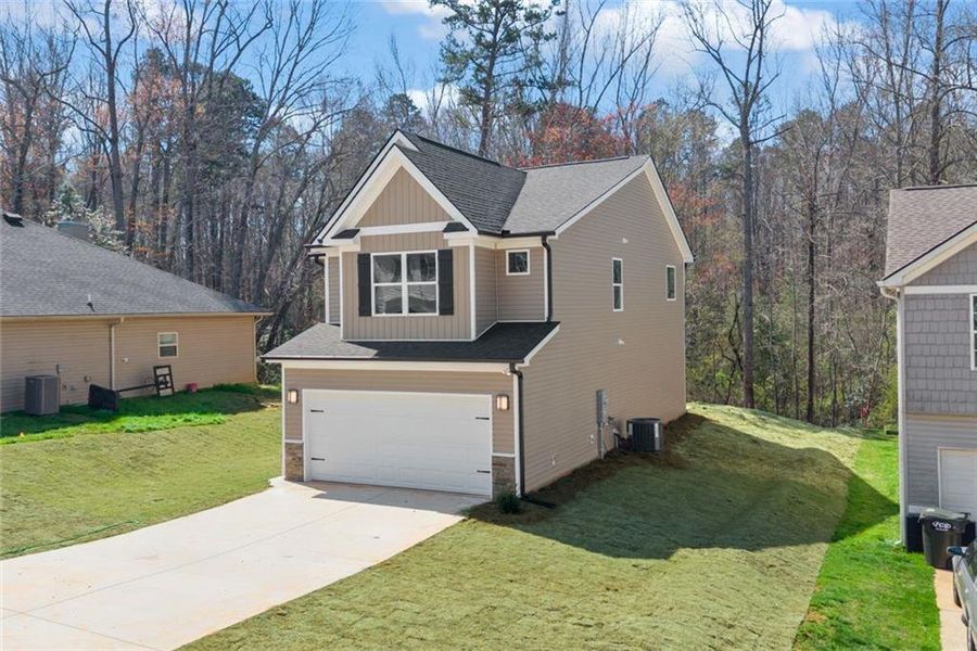 Front exterior of a new home in , Alto, GA, highlighting curb appeal (Image 19).