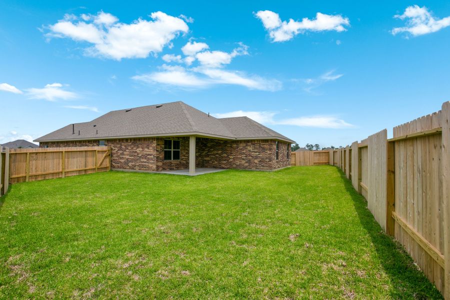 Front exterior of a new home in Bayou Maison, Texas City, TX, highlighting curb appeal (Image 16).