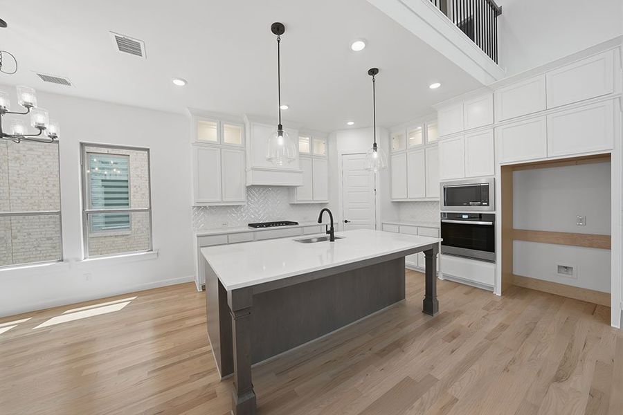 Furnished interior view inside a new home in Light Farms Brenham - 40' Lots, Celina (Image 8).