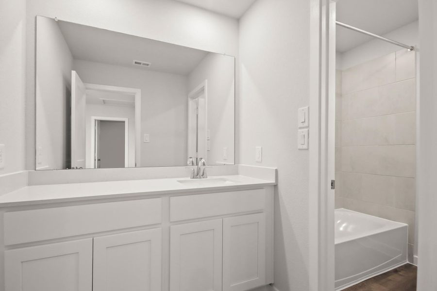 Furnished interior view inside a new home in Northpark South, Porter (Image 7). Furnished interior view inside a new home in Northpark South, Porter (Image 7).