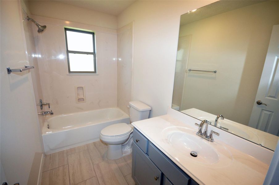 Furnished interior view inside a new home in Pedregal, League City (Image 12).