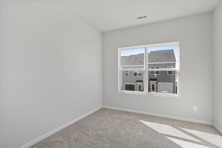 Spacious, unfurnished interior of a new home in Renaissance at White Oak, Garner (Image 25).