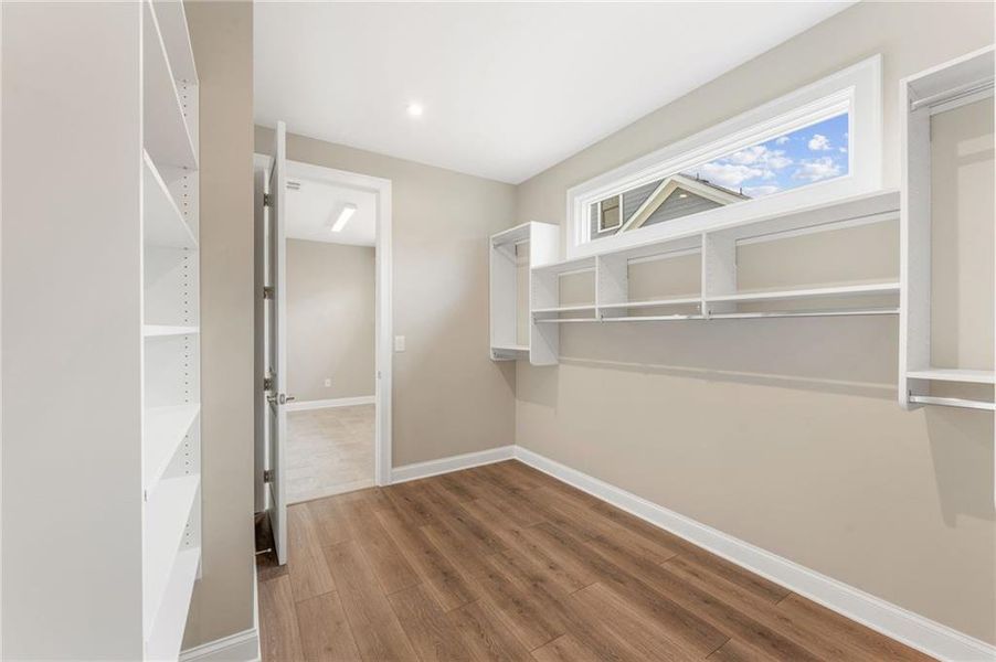 Spacious, unfurnished interior of a new home in The Courtyards at Post Road, Cumming (Image 27).