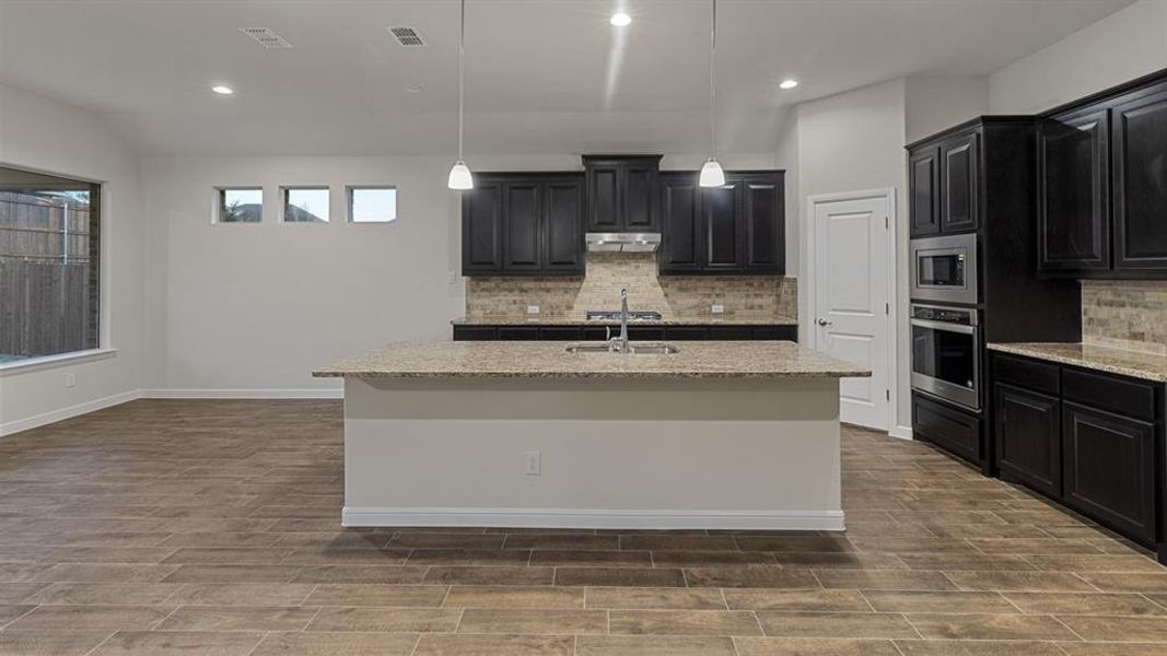 Furnished interior view inside a new home in Lakeview Pointe, Grand Prairie (Image 12).