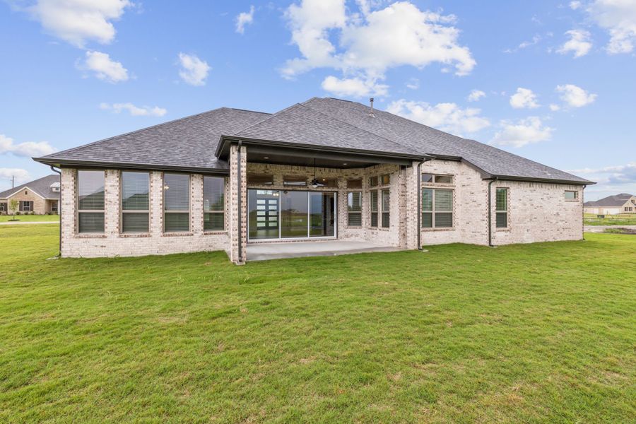 Representative exterior photo of a completed home built from the Alexandria by Chesmar Homes in Lakeway Estates, Waxahachie, TX (Image 11).