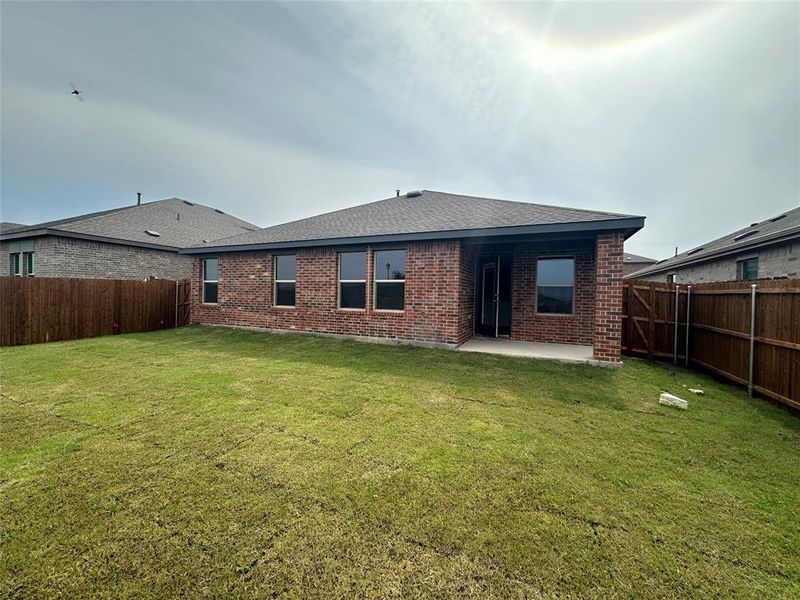Front exterior of a new home in Cartwright Ranch, Crandall, TX, highlighting curb appeal (Image 1). Front exterior of a new home in Cartwright Ranch, Crandall, TX, highlighting curb appeal (Image 1).