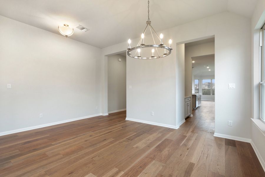 Representative unfurnished interior of a home built from the Palmer by Ashton Woods in The Estates at La Cima, San Marcos (Image 22).