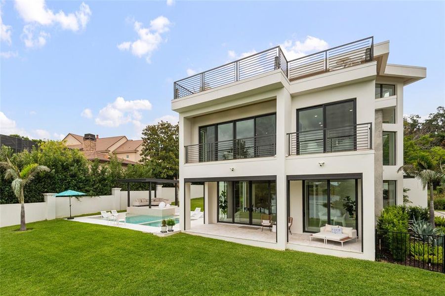 Exterior details and patio area of a home in , Windermere (Image 29).