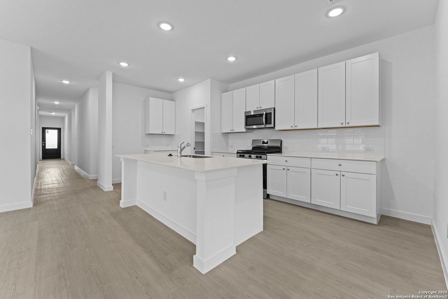 Furnished interior view inside a new home in Waterwheel: Coastline Collection, San Antonio (Image 4).