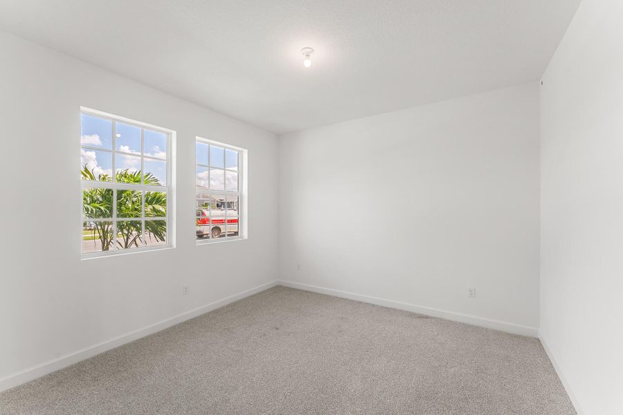 Spacious, unfurnished interior of a new home in Tradition - Cadence, Port St. Lucie (Image 10).