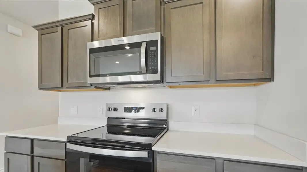 Furnished interior view inside a new home in Riverfield, Josephine (Image 10).