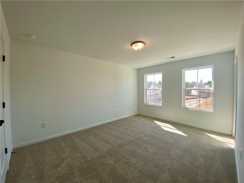 Spacious, unfurnished interior of a new home in Arbors at Richland Creek, Buford (Image 13).