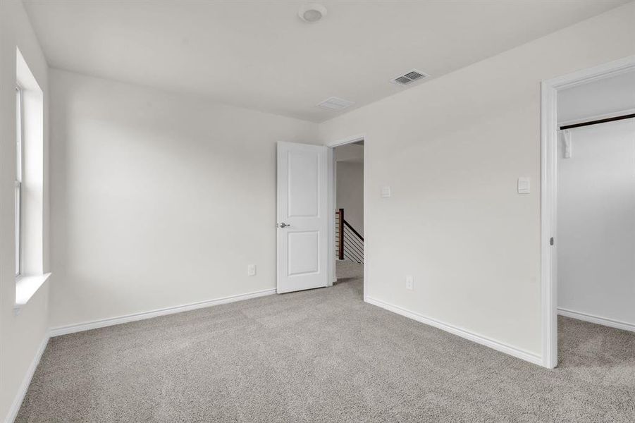 Spacious, unfurnished interior of a new home in The Landing at Hidden Lakes, McKinney (Image 24).