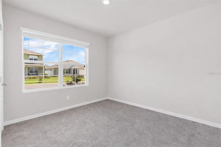 Spacious, unfurnished interior of a new home in Cypress Park Estates, Haines City (Image 22).