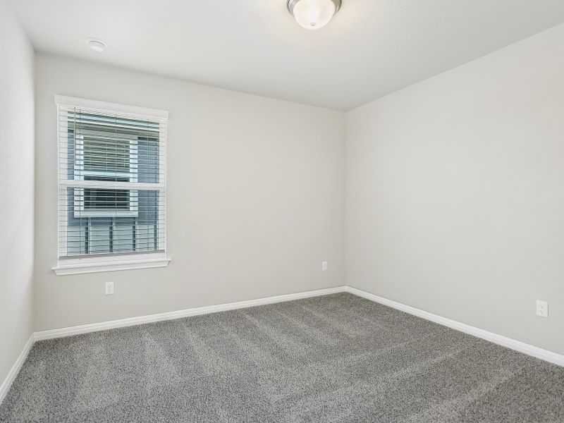Spacious, unfurnished interior of a new home in Butler Farms - Reserve Collection, Liberty Hill (Image 9).