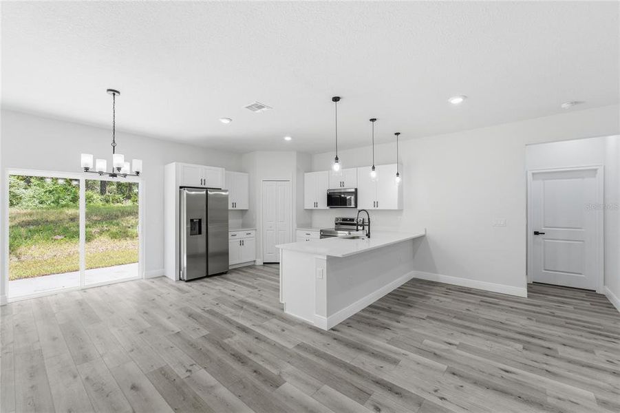 Furnished interior view inside a new home in , Dunnellon (Image 3).