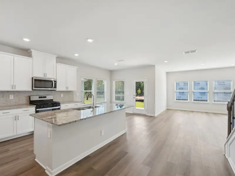 Furnished interior view inside a new home in Martin Springs - Estate Series, Lawrenceville (Image 3).