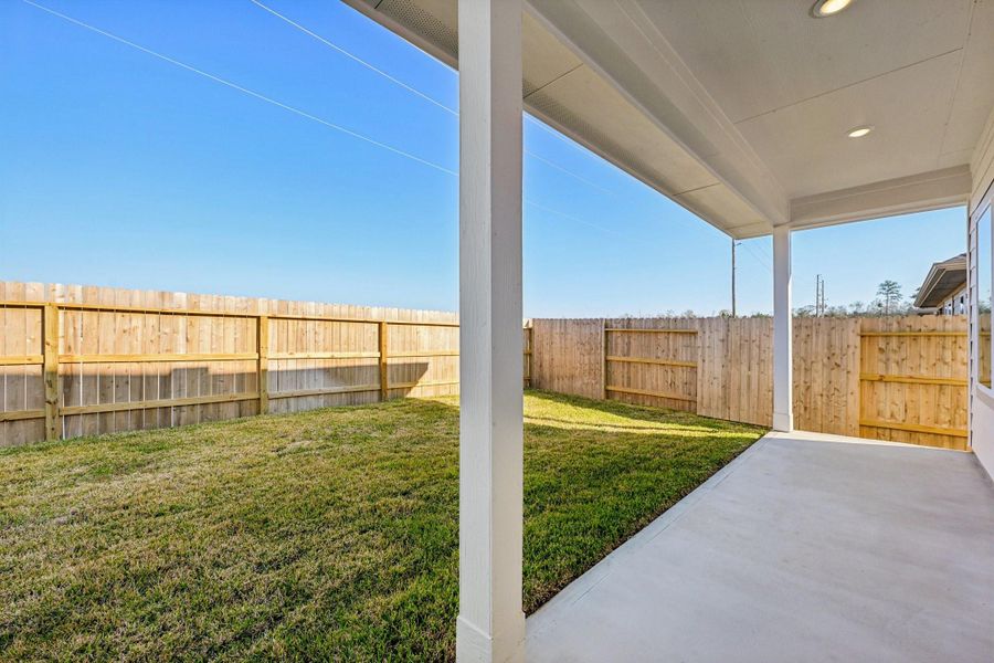 Exterior details and patio area of a home in Landing Meadows - Premier Series, New Caney (Image 22).
