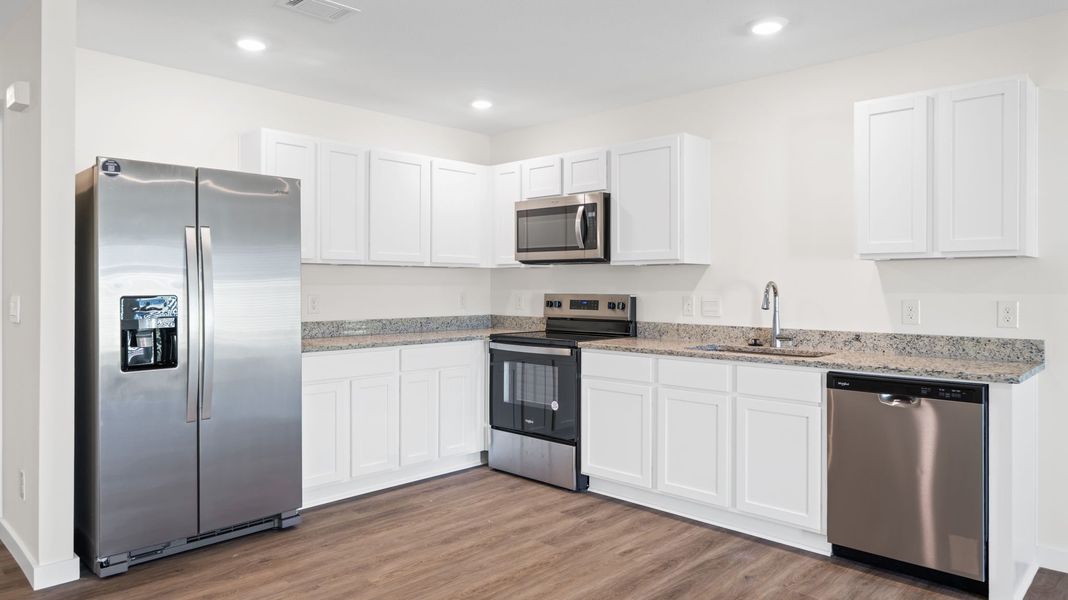 Furnished interior view inside a new home in Crescent Ridge, Niota (Image 5).