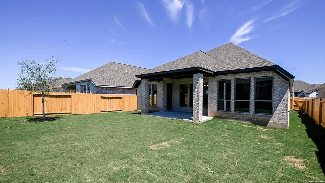 Exterior details and patio area of a home in Meadows of Mill Creek, Seguin (Image 3). Exterior details and patio area of a home in Meadows of Mill Creek, Seguin (Image 3).