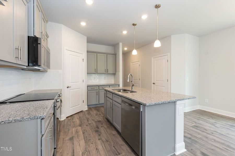 Representative furnished interior of a home built from the 2709 by Adams Homes in The Grove at Ballard, Jacksonville (Image 11).