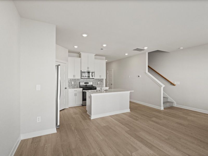 Furnished interior view inside a new home in Northbrook Village Townes, Taylors (Image 5). Furnished interior view inside a new home in Northbrook Village Townes, Taylors (Image 5).