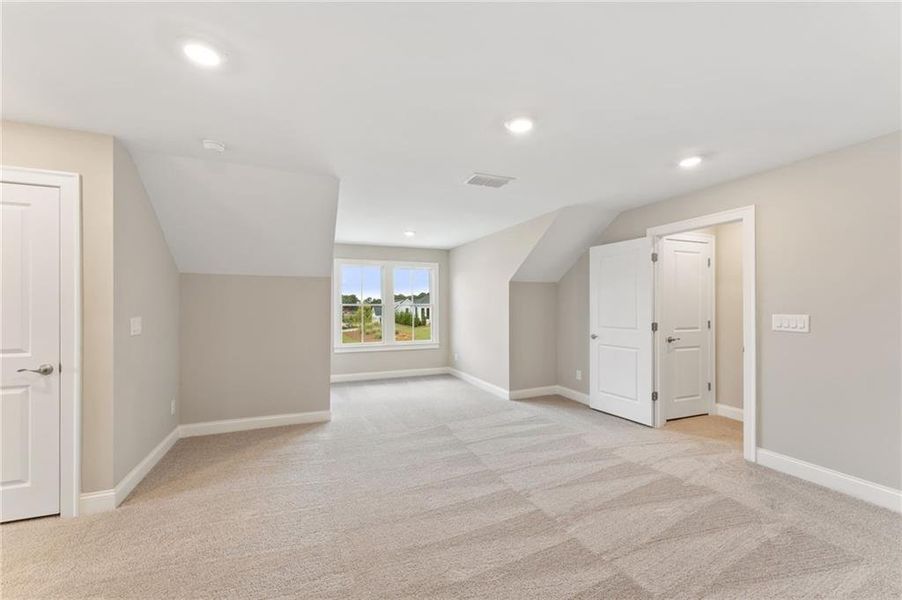 Spacious, unfurnished interior of a new home in The Courtyards of Franklin Goldmine, Cumming (Image 18).