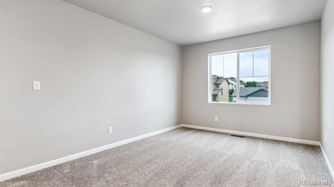 Spacious, unfurnished interior of a new home in Highlands Preserve, Mead (Image 18).