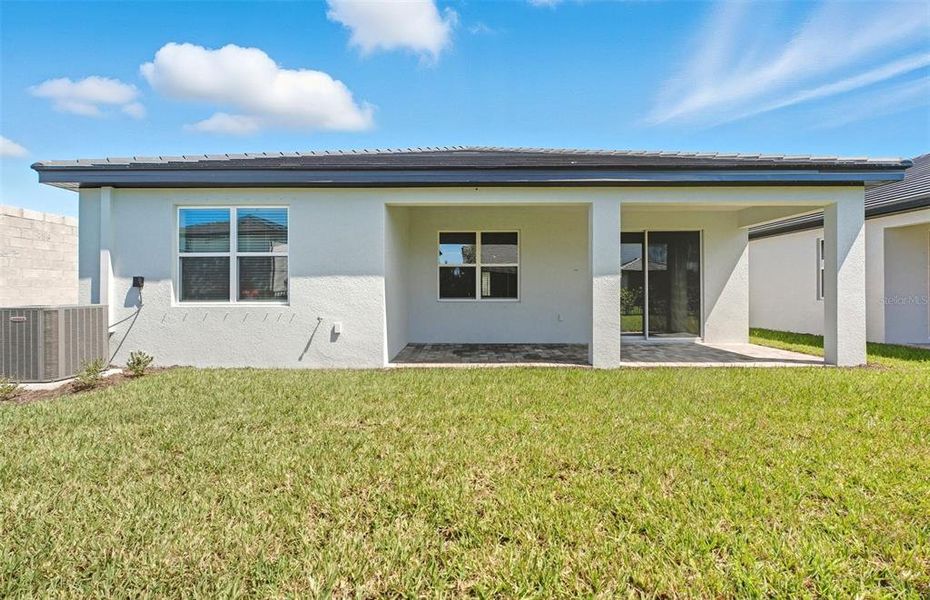 Exterior details and patio area of a home in Longmeadow at North River Ranch, Parrish (Image 3).