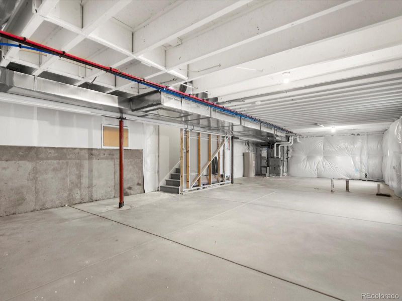 Spacious, unfurnished interior of a new home in Poudre Heights: The Alpine Collection, Windsor (Image 23).