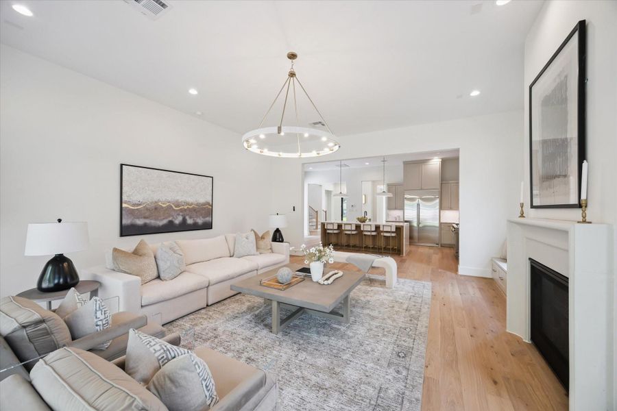 Large and open, custom lighting, fireplace and easy access to the kitchen. What else could one ask for? Large and open, custom lighting, fireplace and easy access to the kitchen. What else could one ask for?