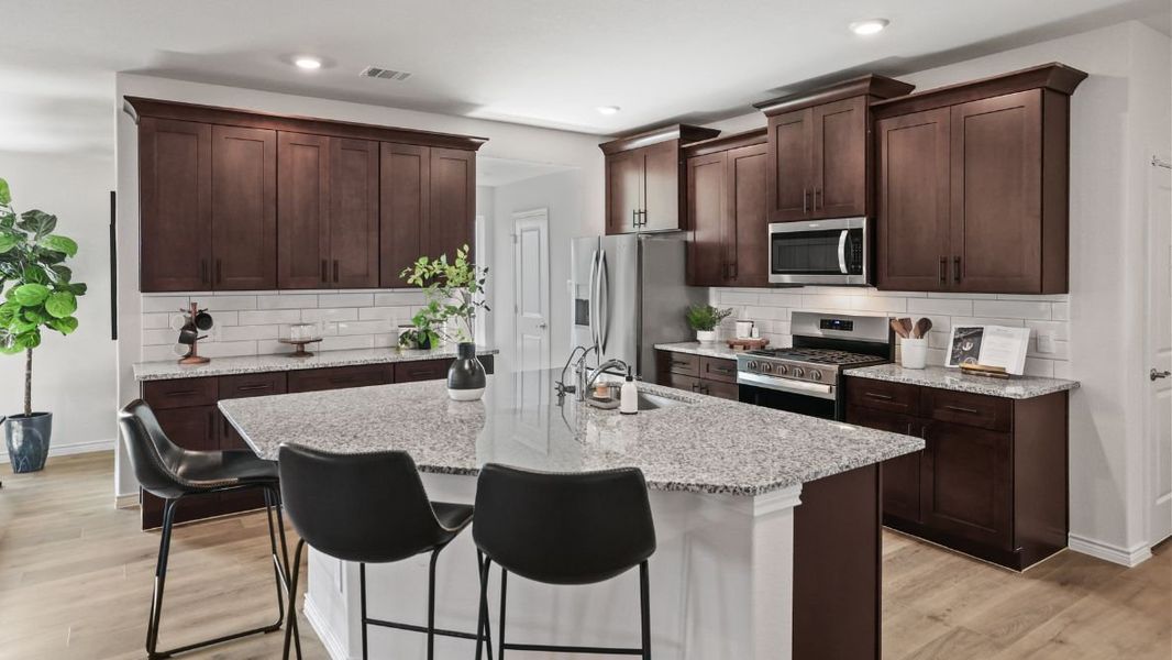 Furnished interior view inside a new home in Prairie Oaks, Oak Point (Image 5).