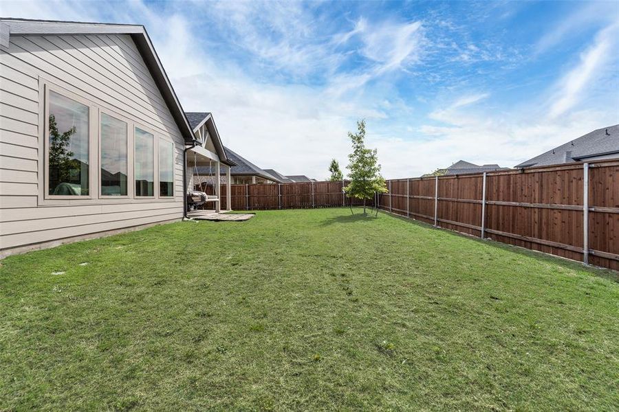 Exterior details and patio area of a home in Devonshire, Forney (Image 20).