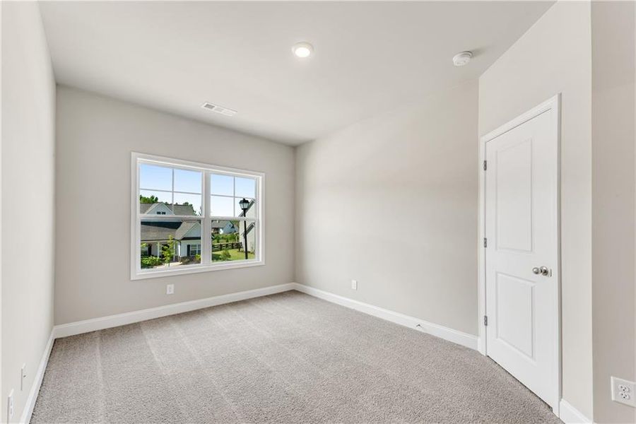 Spacious, unfurnished interior of a new home in Hidden Fields, Hoschton (Image 39).