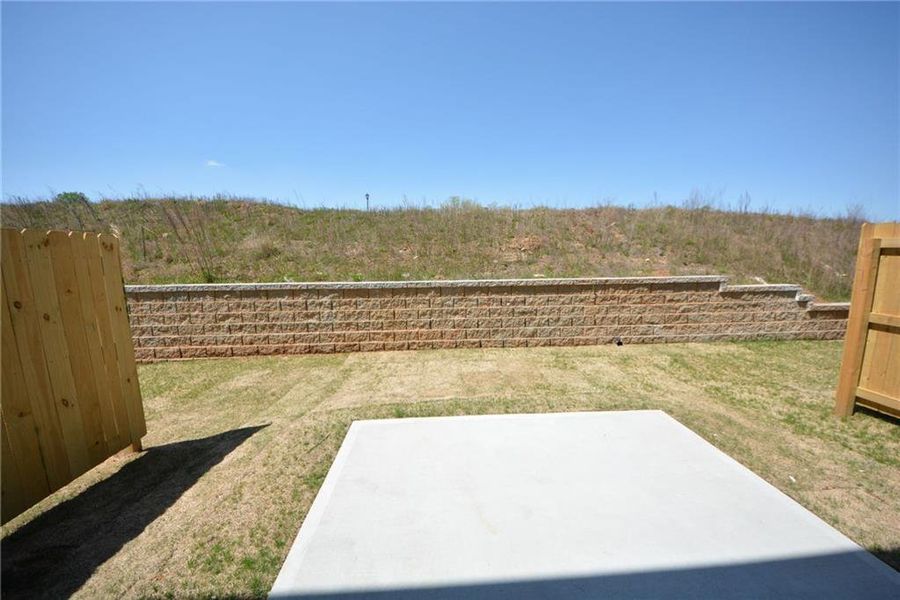 Exterior details and patio area of a home in Somerset at Riverbrook, Gainesville (Image 4). Exterior details and patio area of a home in Somerset at Riverbrook, Gainesville (Image 4).