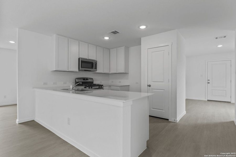 Furnished interior view inside a new home in Waterwheel: Cottage Collection, San Antonio (Image 9). Furnished interior view inside a new home in Waterwheel: Cottage Collection, San Antonio (Image 9).