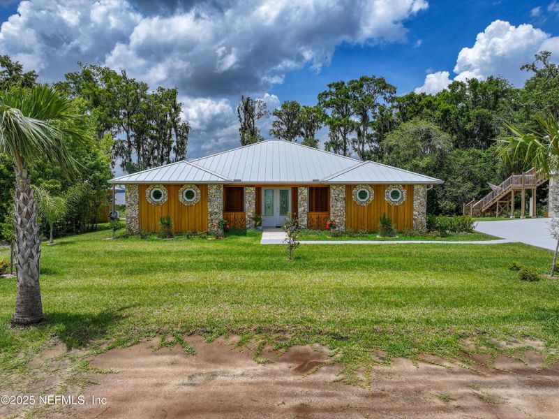 Front exterior of a new home in , East Palatka, FL, highlighting curb appeal (Image 53). Front exterior of a new home in , East Palatka, FL, highlighting curb appeal (Image 53).