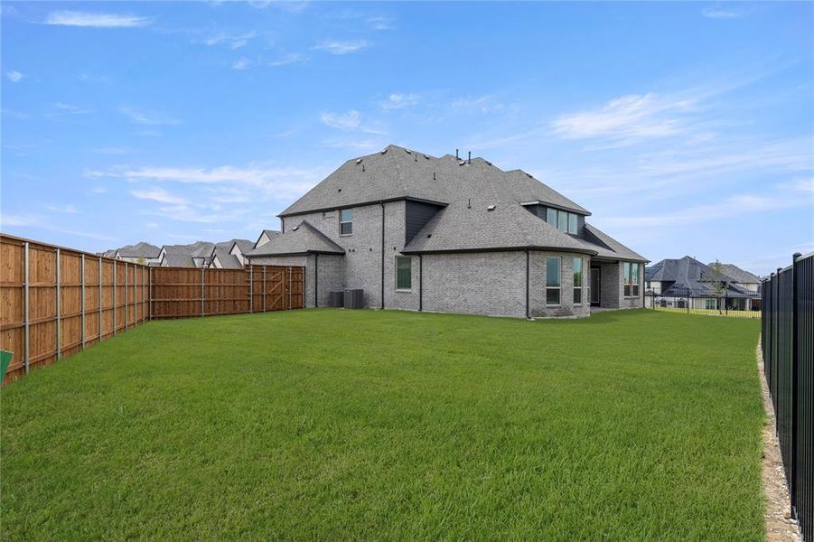 Front exterior of a new home in Cambridge Estates, Prosper, TX, highlighting curb appeal (Image 20).