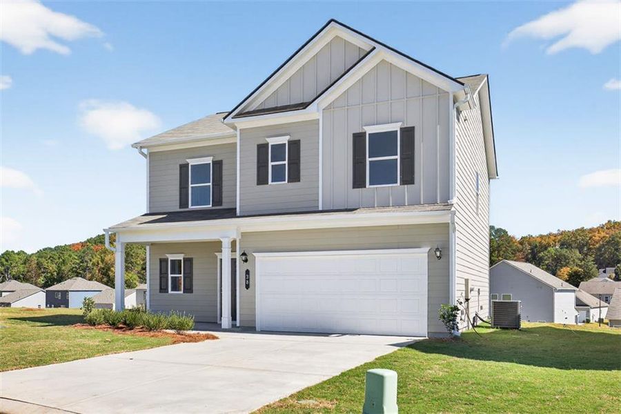 Front exterior of a new home in Longbrooke, Rome, GA, highlighting curb appeal (Image 2).