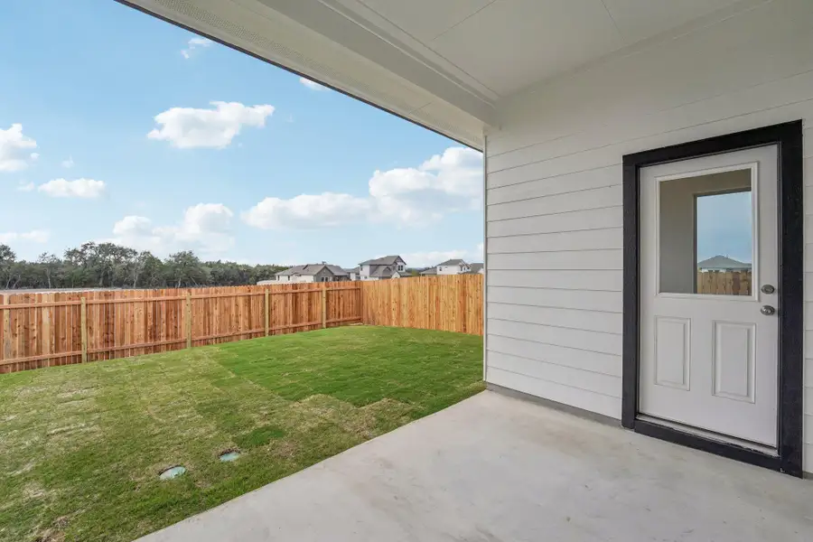 Exterior details and patio area of a home in Sage Hollow, Kyle (Image 4).