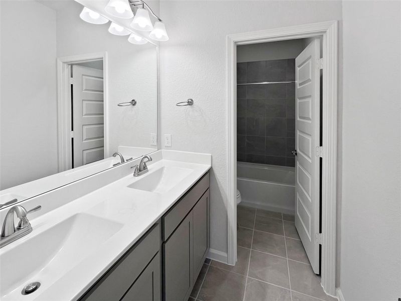 The Princeton II- Hall Bath Upstairs with Dual Sinks. Home under construction, image used for illustrative purposes only, colors and options will vary. The Princeton II- Hall Bath Upstairs with Dual Sinks. Home under construction, image used for illustrative purposes only, colors and options will vary.