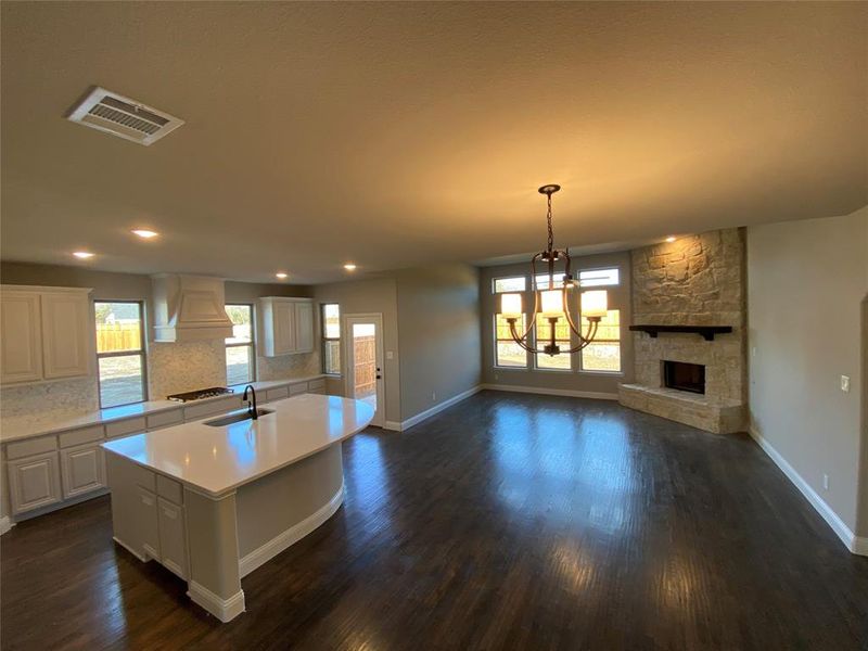 View of impressive great room from the stairs. Thos hardwoods are gorgeous