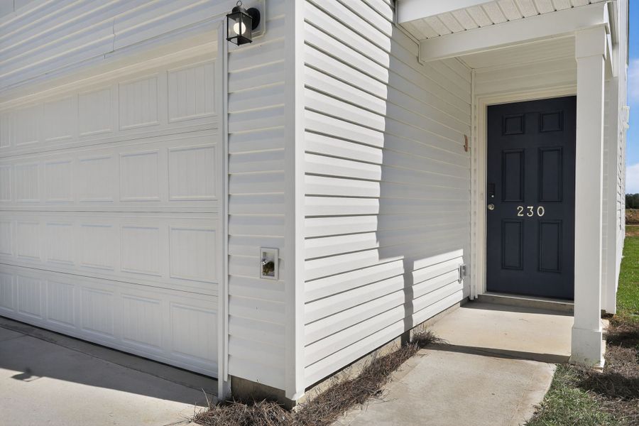 A white garage door. A white garage door.